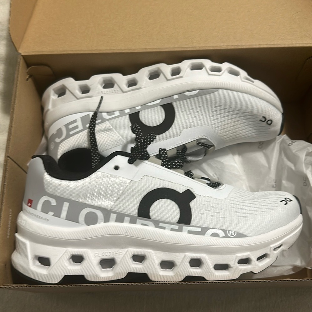 On cloudmonster white runner